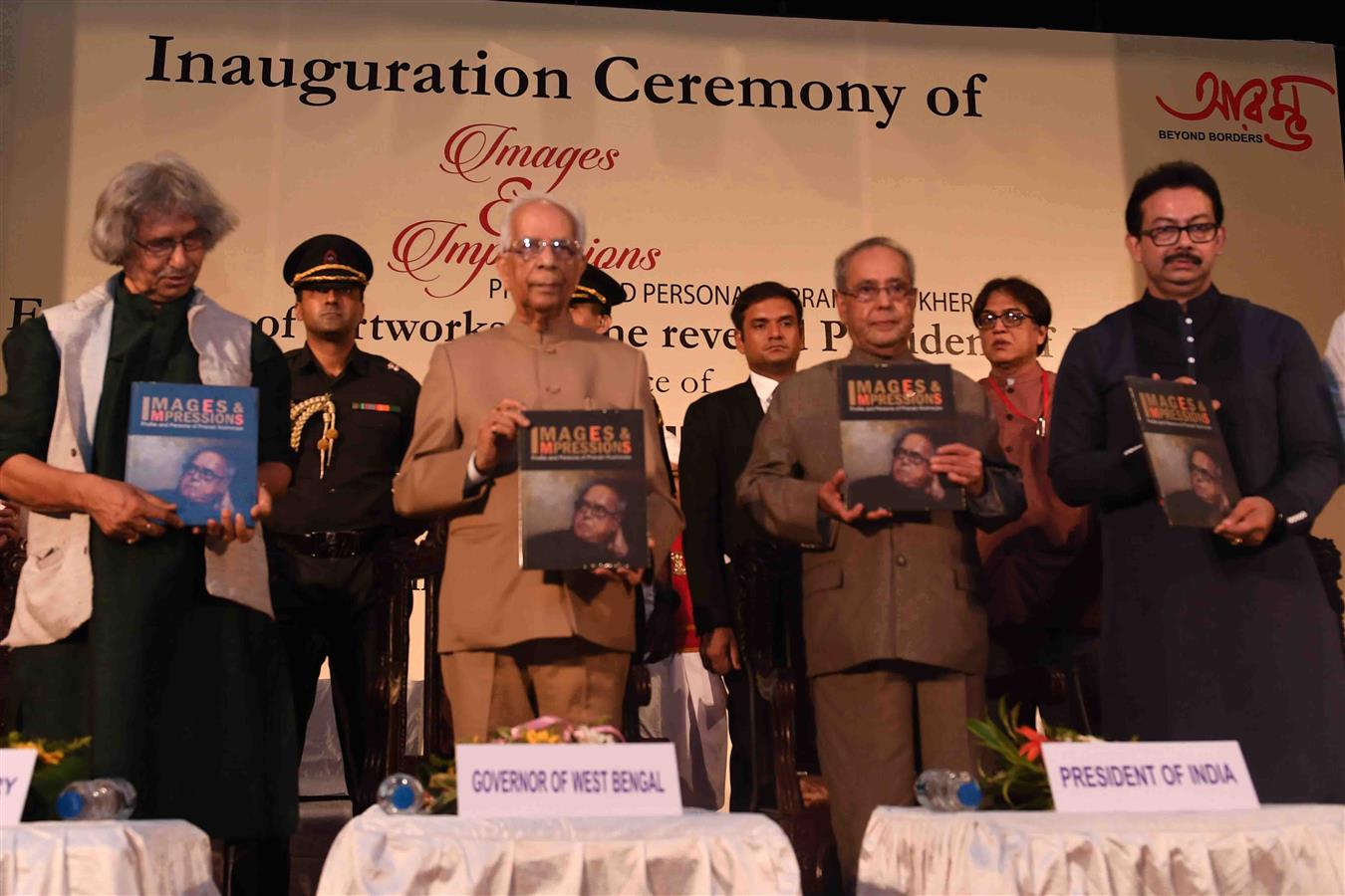 The Governor of West Bengal, Shri Keshari Nath Tripathi releasing the Coffee Table book ‘Images and Impressions – Profile and Persona of Pranab Mukherjee’ and presenting the First Copy to the President of India, Shri Pranab Mukherjee at Kolkata, West Beng