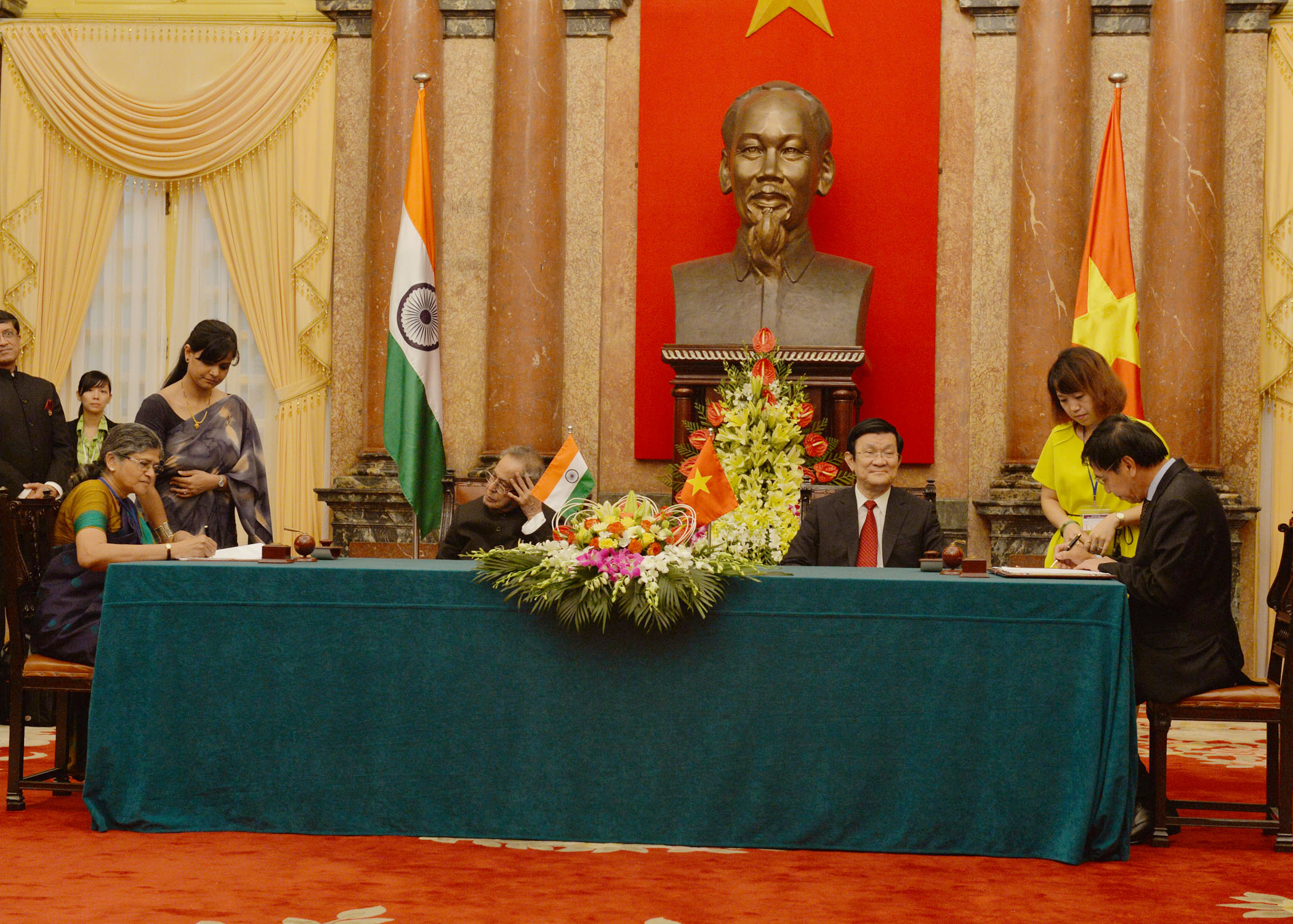 The President of India, Shri Pranab Mukherjee and the President Socialist Republic of Vietnam, H.E. Mr. Truong Tan Sang witnessing the signing of the Agreements and MOU between India and Vietnam during the State Visit of President of India to Vietnam at H 