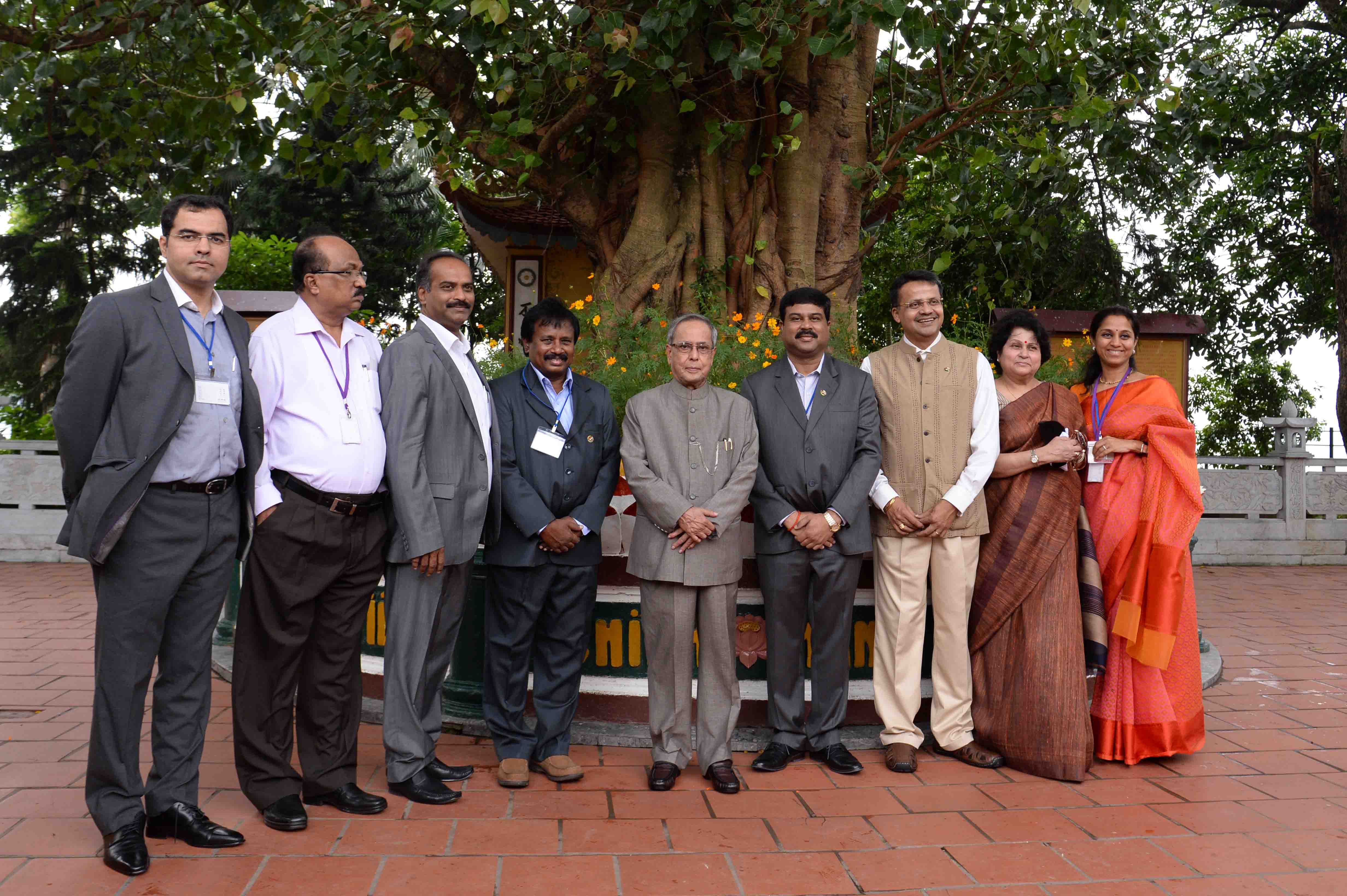 The President of India, Shri Pranab Mukherjee with his official delegation members in front of Bodhi Tree which was presented by the Former President of India, Dr. Rajendra Prasad to President, Ho Chi Minhin in March 1956 at Hanoi in Vietnam on September 