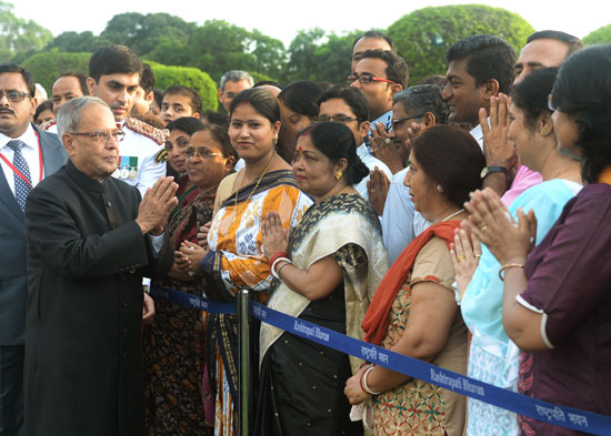 The President of India, Shri Pranab Mukherjee meeting invitees in the Central Lawn of Mughal Garden at Rashtrapati Bhavan in New Delhi on August 15, 2013 at the 'At Home' Reception hosted by the him on the occasion of 67th Independence Day.