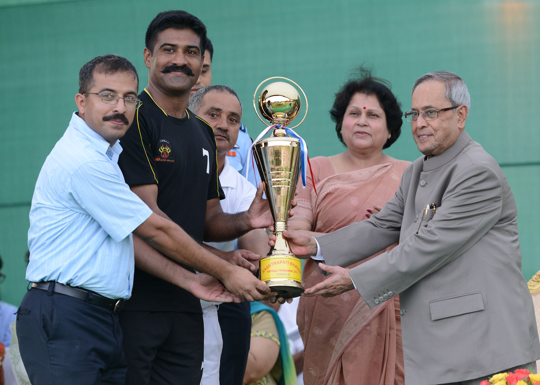 The President of India, Shri Pranab Mukherjee during presentation of prizes after final match of Rashtrapati Bhavan Football Tournament (RBFT) at Dr. Rajendra Prasad Sarvodaya Vidyalaya, President's Estate on September 21, 2014. 