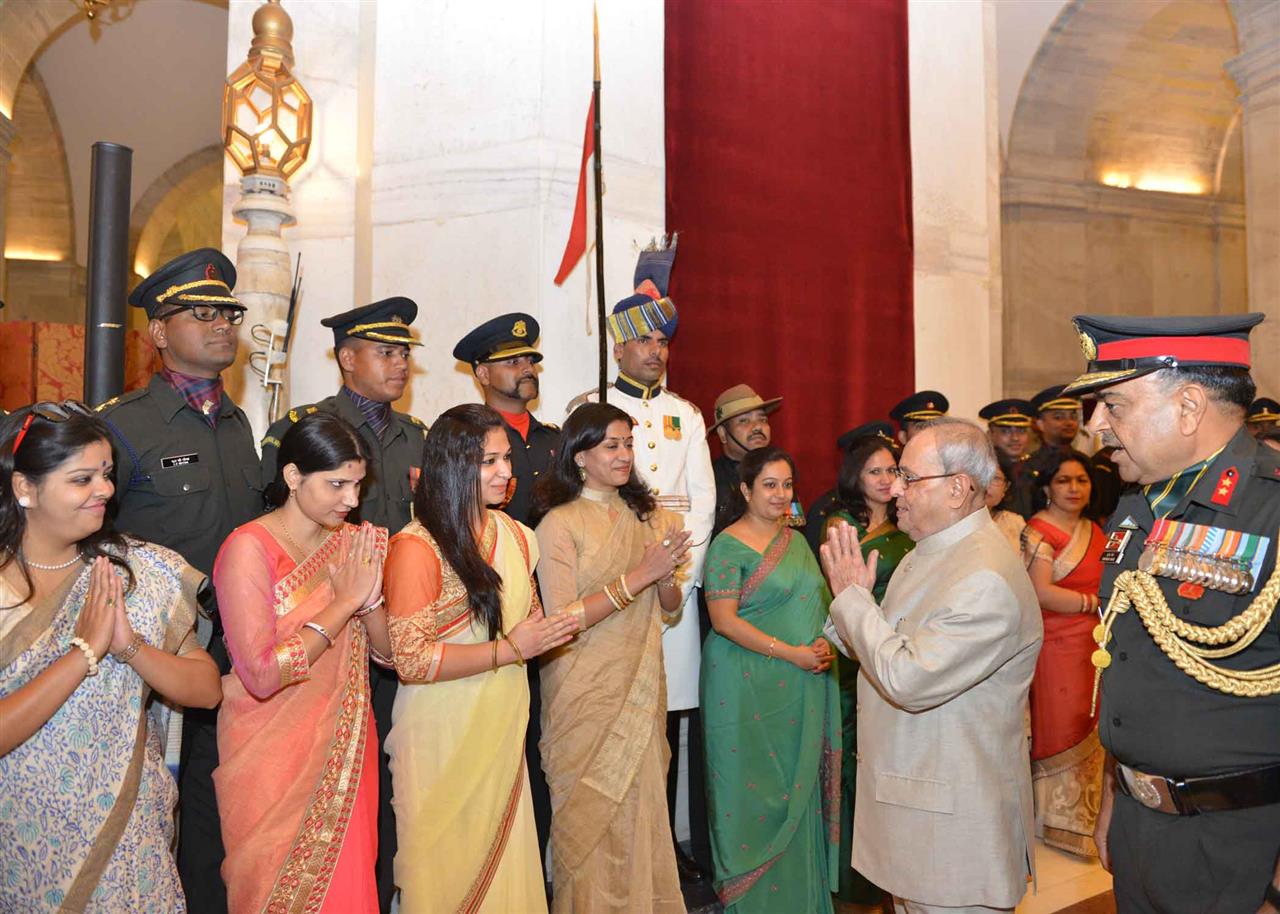 The President of India, Shri Pranab Mukherjee meeting the Officers, JCOs and other ranks of Territorial Army along with their spouses on the occasion of Raising Day of Territorial Army at Rashtrapati Bhavan on October 6, 2015.