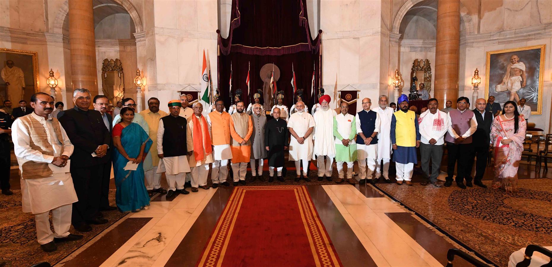 The President of India, Shri Pranab Mukherjee, Vice President of India, Shri M. Hamid Ansari and the Prime Minister of India, Shri Narendra Modi with the newly sworn-in Union Ministers at Rashtrapati Bhavan on July 5, 2016 