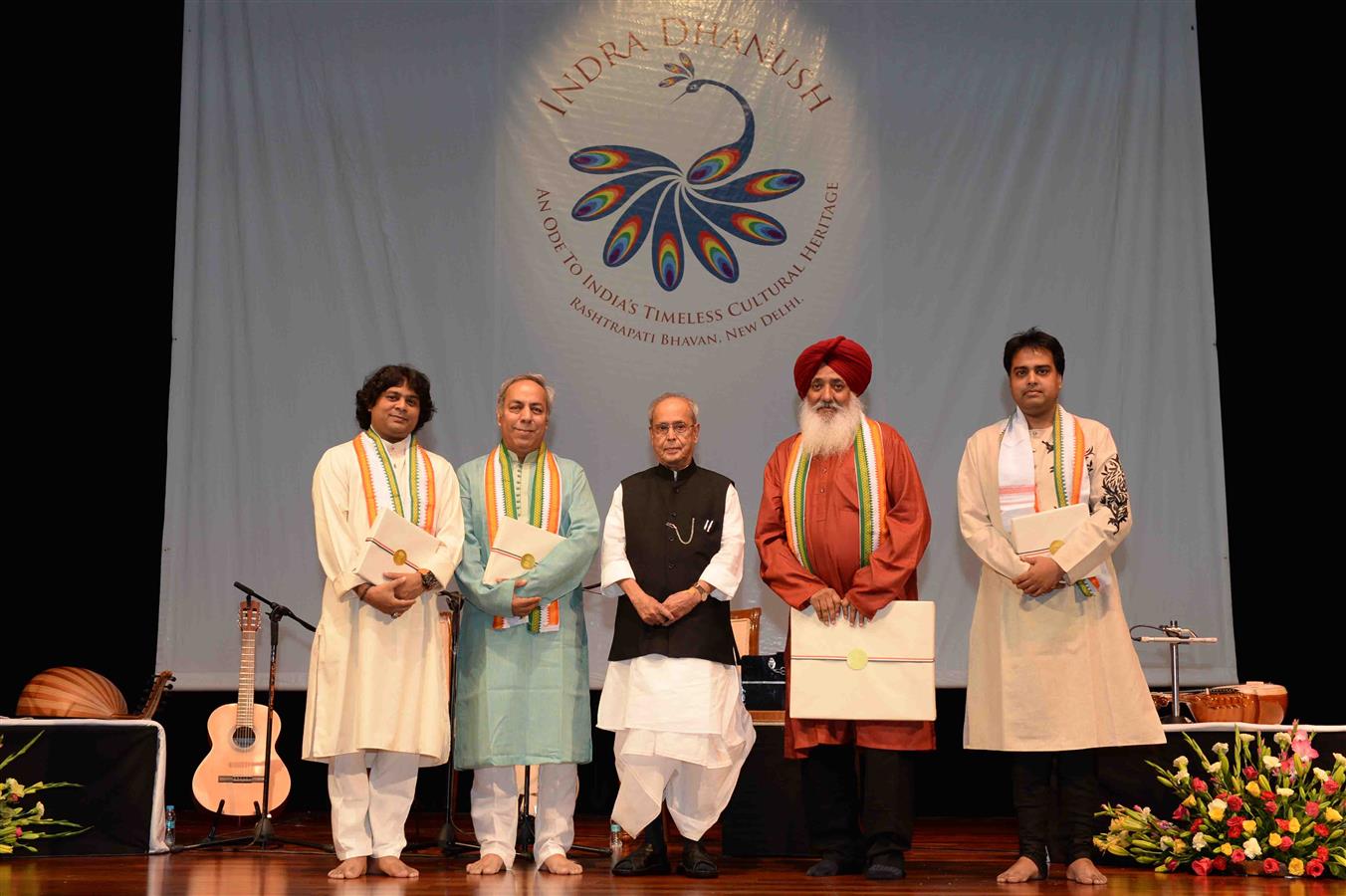 The President of India, Shri Pranab Mukherjee with artists after witnessing a Sufi Music Performance by Shri Madan Gopal Singh at Rashtrapati Bhavan Auditorium on July 9, 2016. 