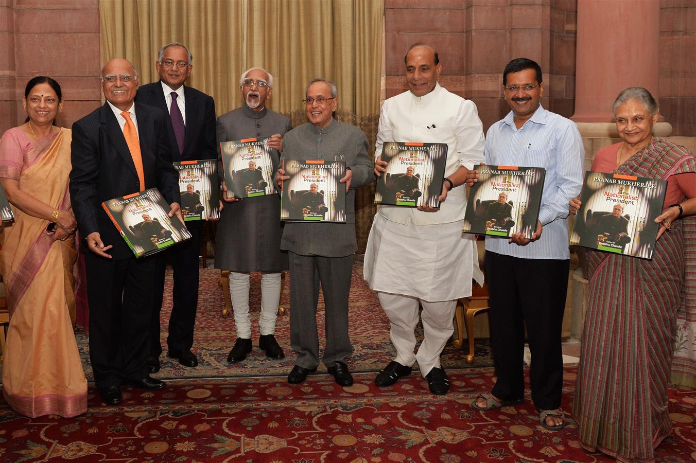 The President of India, Shri Pranab Mukherjee receiving the first copy of the Coffee Table Book 'The Nationalist President Pranab Mukherjee' edited by Shri Prabhu Chawla at Rashtrapati Bhavan on October 7, 2015.