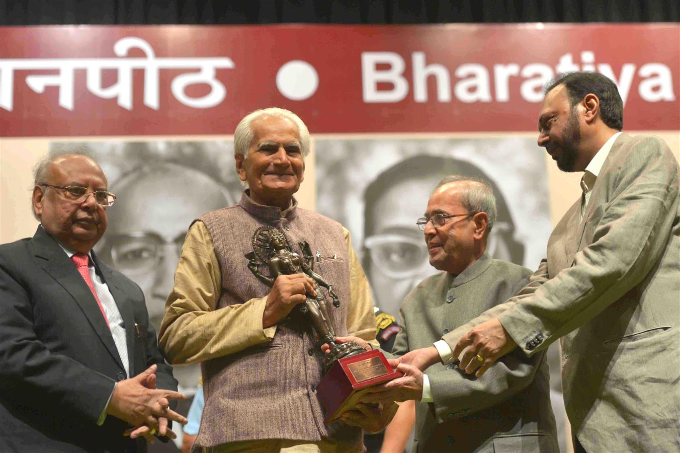 The President of India, Shri Pranab Mukherjee presenting the 51st Jnanpith Award to Dr. Raghuveer Chaudhary at Balyogi Auditorium, Parliament Library Building, Parliament House in New Delhi on July 11, 2016. 