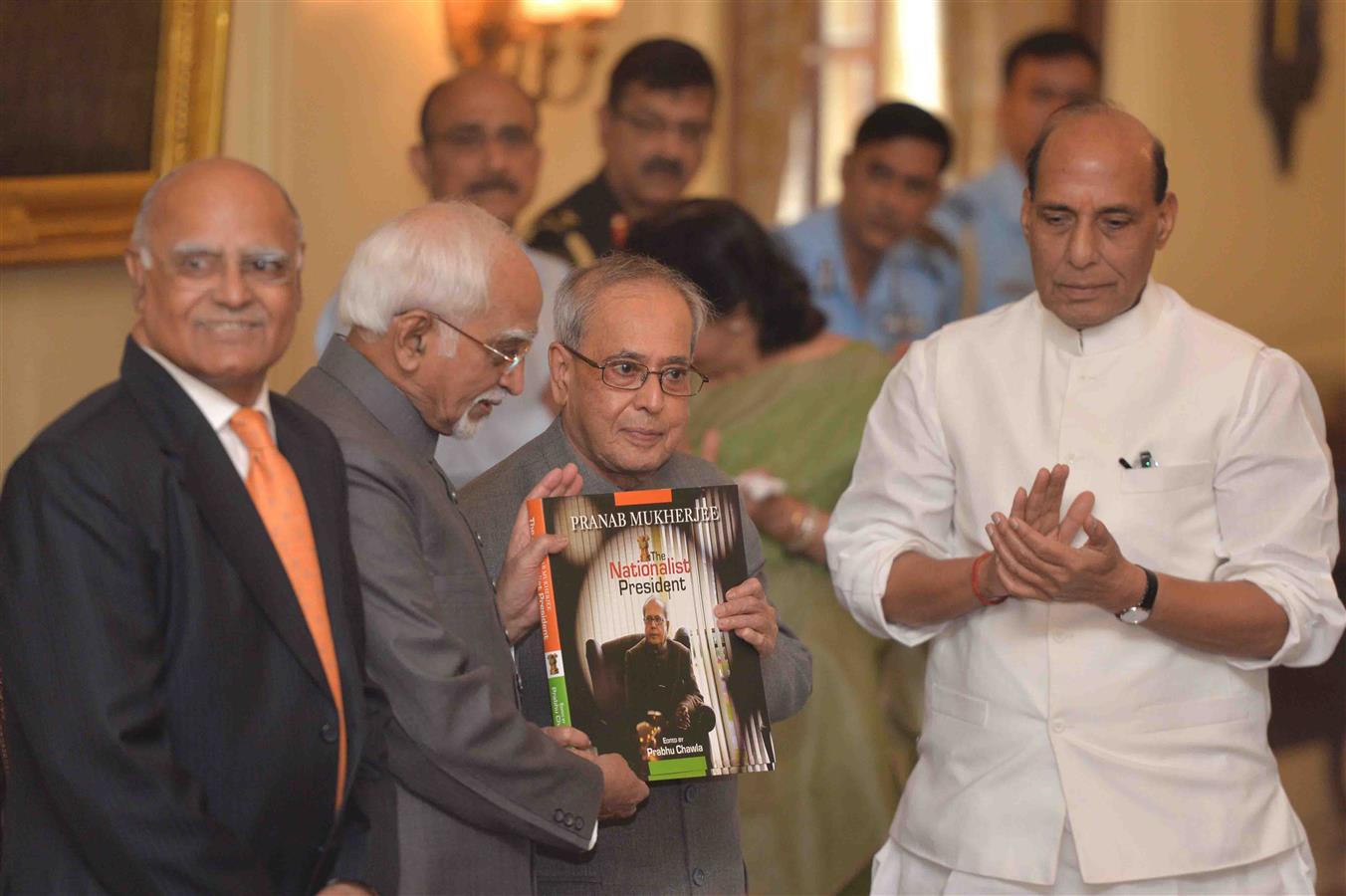 The President of India, Shri Pranab Mukherjee receiving the first copy of the Coffee Table Book 'The Nationalist President Pranab Mukherjee' edited by Shri Prabhu Chawla at Rashtrapati Bhavan on October 7, 2015.