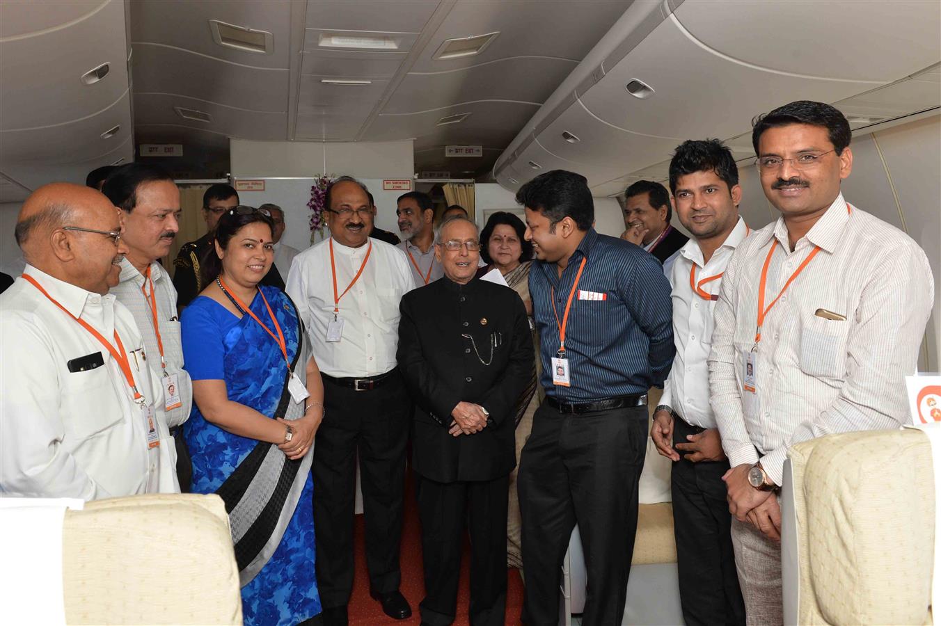 The President of India, Shri Pranab Mukherjee interacting with the accompanying officials and media delegation in a special Air India flight on his way to Amman, Jordan on October 10, 2015.