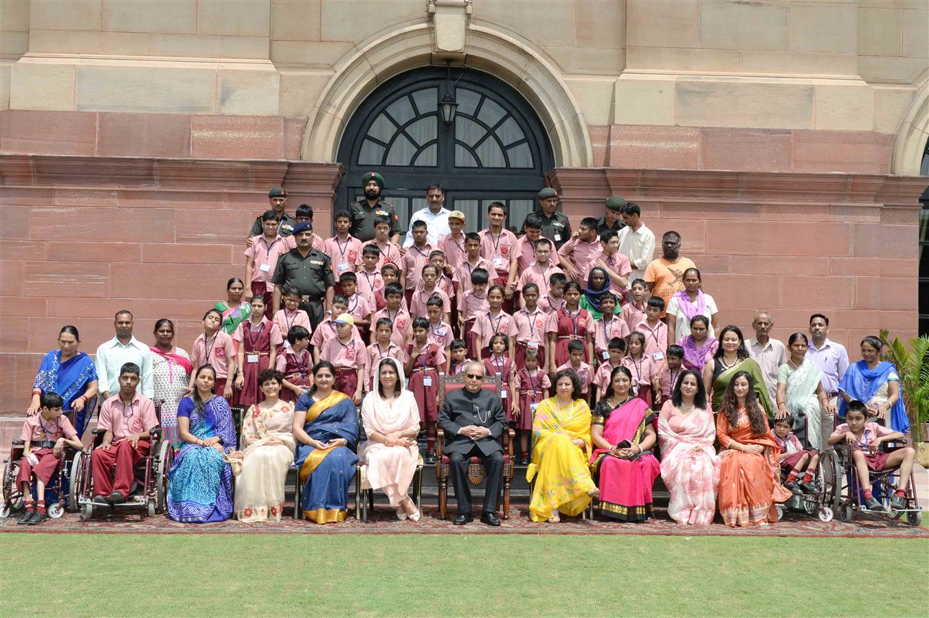 The President of India, Shri Pranab Mukherjee with the children from Asha School, Delhi Cantt at Rashtrapati Bhavan on July 19, 2016. 