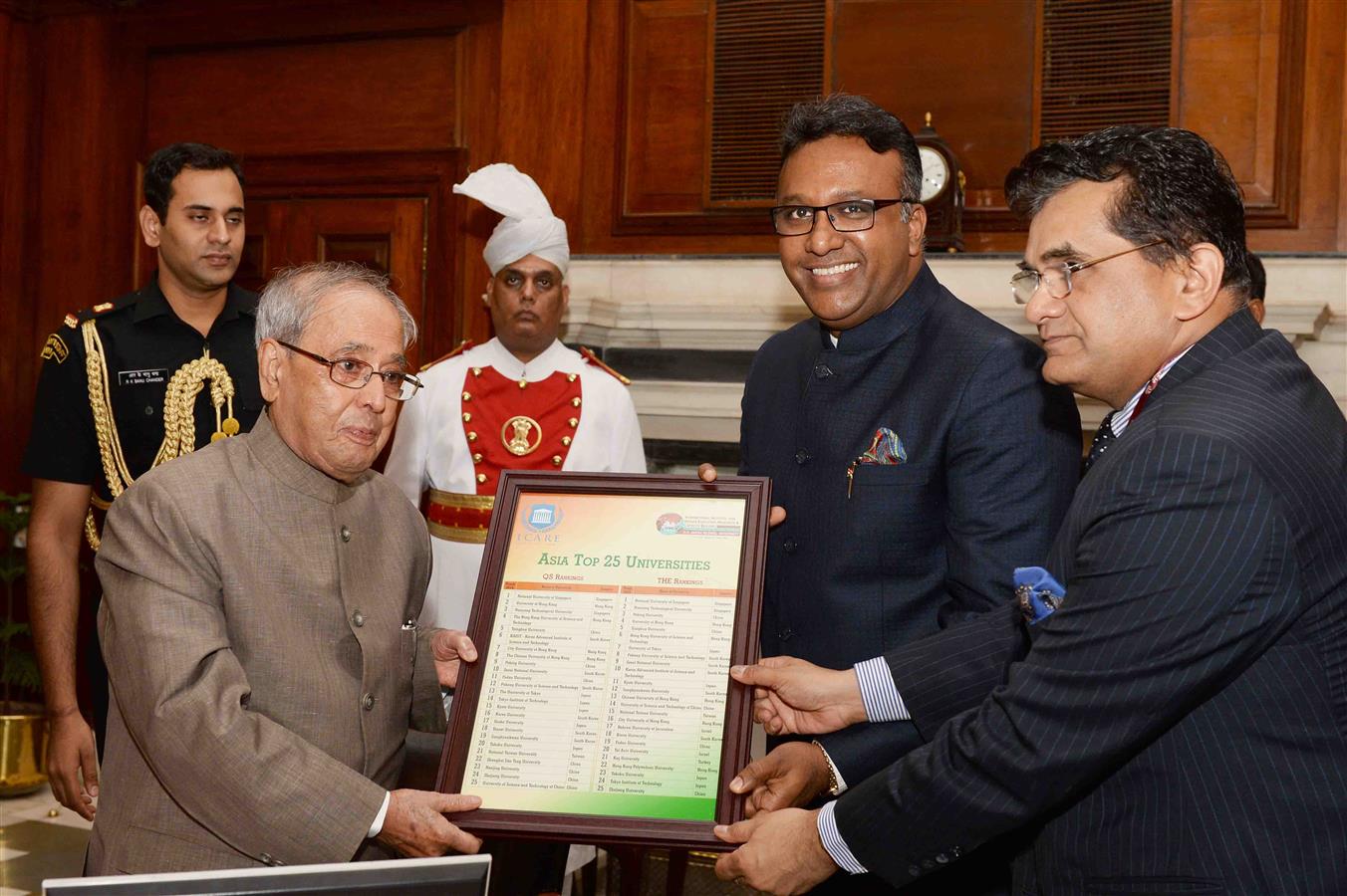 The President of India, Shri Pranab Mukherjee receiving the "State of Indian Universities in the Global Academic Rankings" (Asia Top 25) from Shri Amitabh Kant and Dr. C Raj Kumar at Rashtrapati Bhavan on July 20, 2016. 