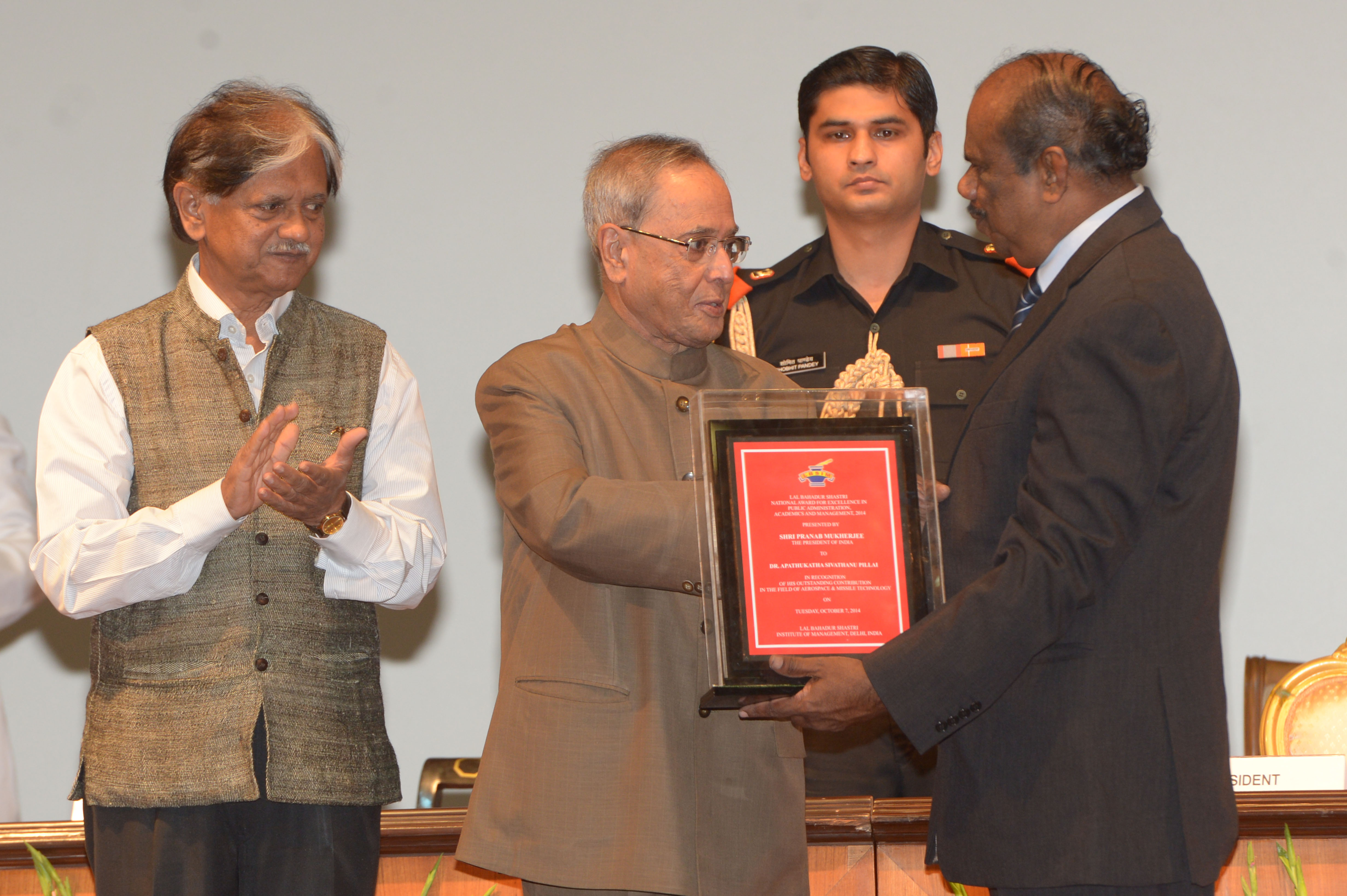 The President of India, Shri Pranab Mukherjee presenting the Lal Bahadur Shastri National Award for Excellence in Public Administration, Academics and Management for the year 2014 to Dr. A Sivathanu Pillai, Chief Controller (R & D), DRDO and Chief Executi 