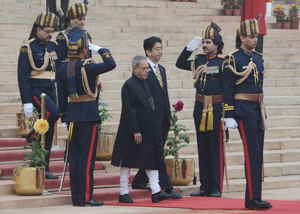 The President of India Shri Pranab Mukherjee, Chief Guest at the 65th Republic Day Parade, the Prime Minister of Japan, H.E. Mr. Shinzo Abe before departure from Rashtrapati Bhavan for attending the 65th Republic Day Parade at Rajpath in New Delhi on Janu 