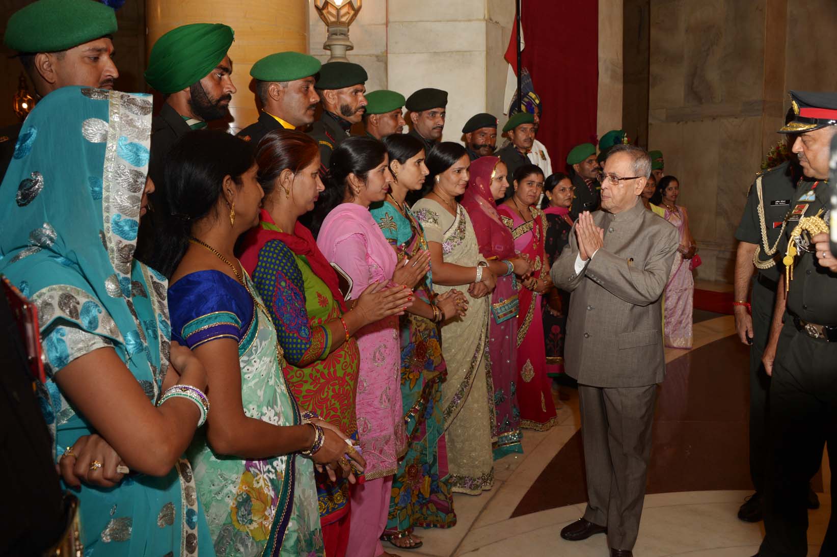 The President of India, Shri Pranab Mukherjee meeting with Territorial Army Officers JCOs and Others Ranks along with Spouses on the occasion of Raising Day of Territorial Army Day on October 10, 2014. 