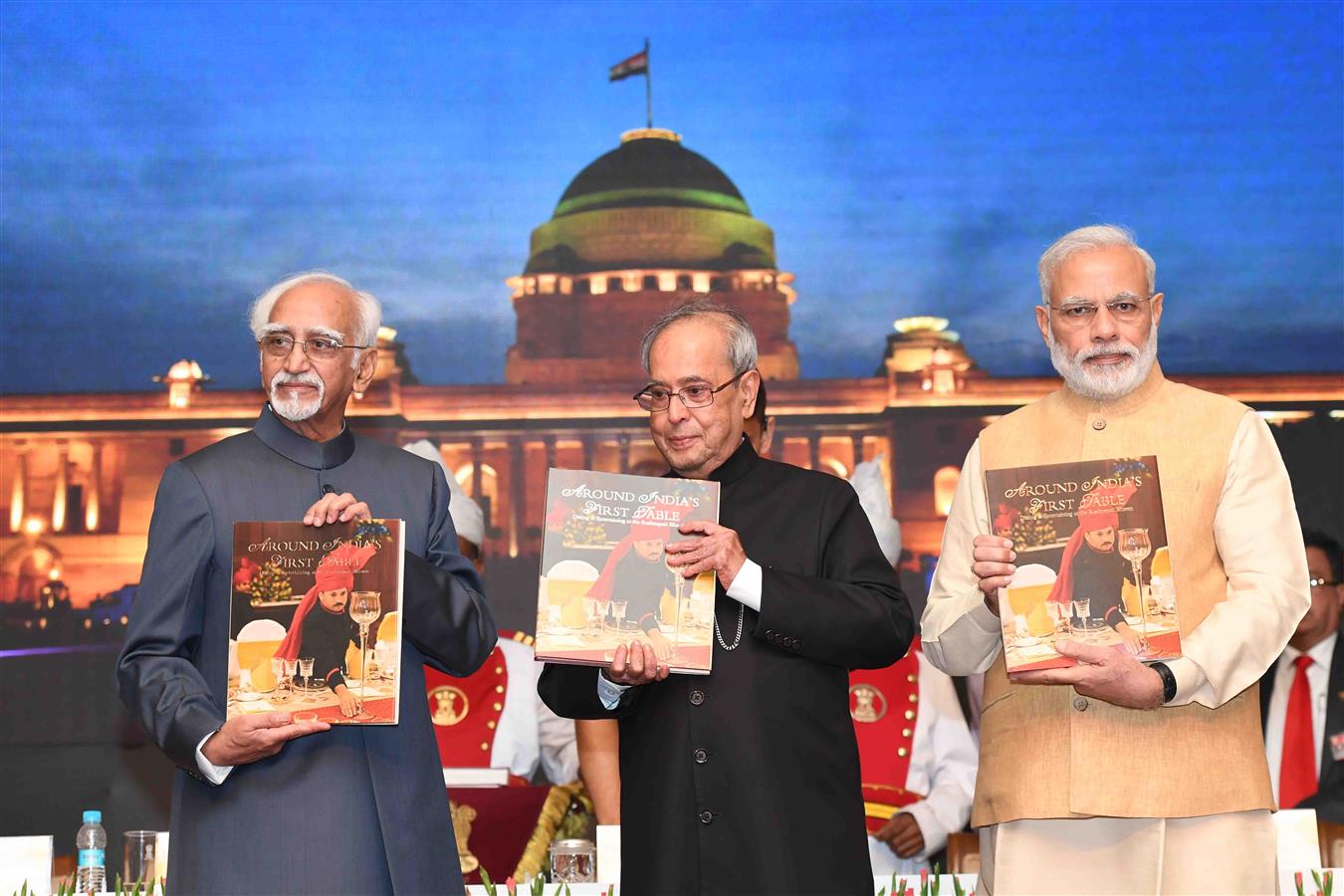 TThe Vice President of India, Shri M. Hamid Ansari releasing the book titled "Around India's First Table : Dining and Entertaining at Rashtrapati Bhavan" and first copy presented to the President of India, Shri Pranab Mukherjee at Rashtrapati Bhavan on  J 