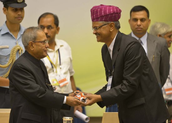 The President of India, Shri Pranab Mukherjee while presenting a National Award for the year 2012 on the occasion of Teachers’ Day at Vigyan Bhavan in New Delhi on September 5, 2013.