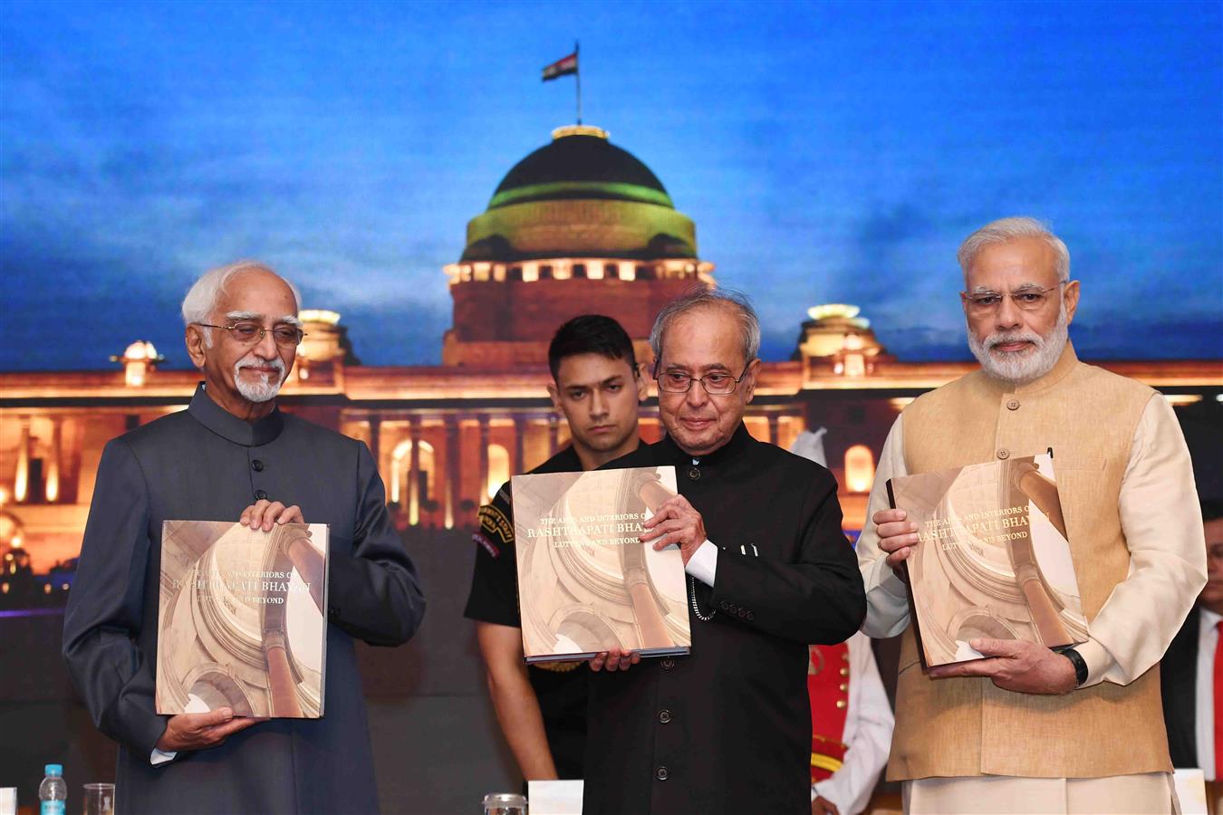 The Vice President of India, Shri M. Hamid Ansari releasing the book titled "The Arts and Interiors of Rashtrapati Bhavan: Lutyens and Beyond” and first copy presented to the President of India, Shri Pranab Mukherjee at Rashtrapati Bhavan on July 25, 2016 