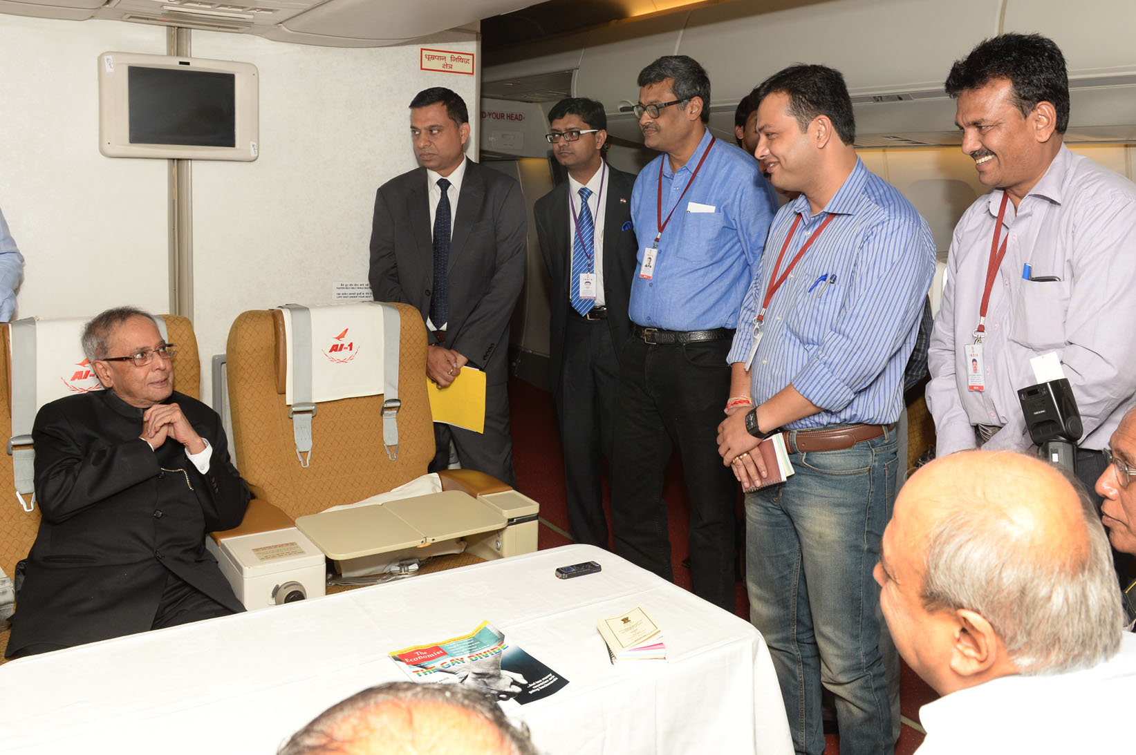 The President of India, Shri Pranab Mukherjee interacting with his accompanying media personnel on board his Special Aircraft on his way to Norway, OSLO for his State Visits to Norway and Finland on October 12, 2014. 