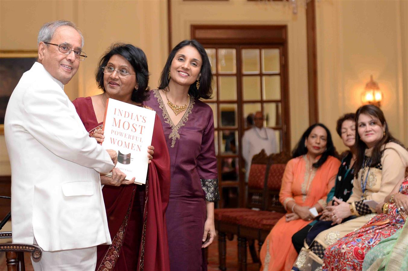 The President of India, Shri Pranab Mukherjee receiving a Coffee Table Book 'India's Most Powerful Women' from Ms. Prem Ahluwalia, Associate Editor, Young India at Rashtrapati Bhavan on July 28, 2016. 