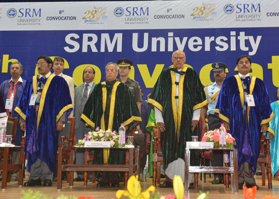 The President of India, Shri Pranab Mukherjee presenting a PhD degree to a student at the Convocation of SRM Univeristy at Chennai, Tamil Nadu on December 28, 2012. Also seen are (left to Right) the Chancellor of the SRM University, Dr T.R. Pachamuthu and