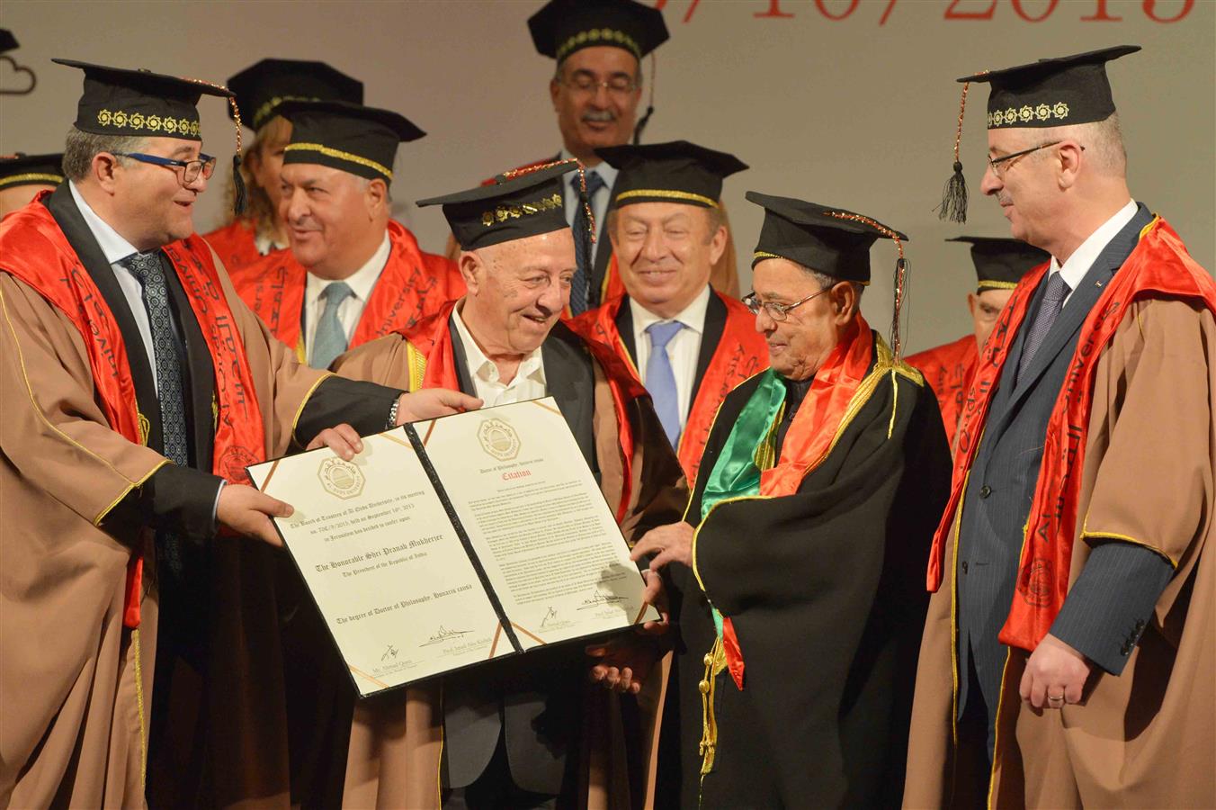 The Prime Minister of Palestine presenting Honorary Doctorate Degree to the President of India, at Al-Quds University Abudis, in Palestine on October 13, 2015.