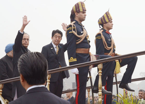 The President of India, Shri Pranab Mukherjee, Chief Guest at the 65th Republic Day Parade, the Prime Minister of Japan, H.E. Mr. Shinzo Abe arriving for the Parade in New Delhi on January 26, 2014. 