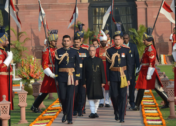 The President of India, Shri Pranab Mukherjee arriving in procession for the Republic Day Reception hosted by him, on the lawns of the Mughal Gardens at Rashtrapati Bhavan in New Delhi on January 26, 2014. 