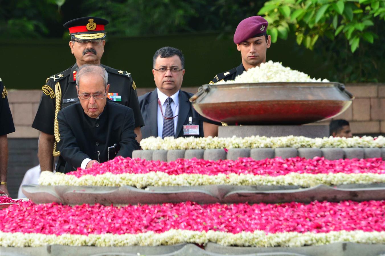 The President of India, Shri Pranab Mukherjee paying floral tributes at the Samadhi of the Former Prime Minister of India, Late Shri Rajiv Gandhi on the occasion his Birth Anniversary in New Delhi on August 20, 2016. 