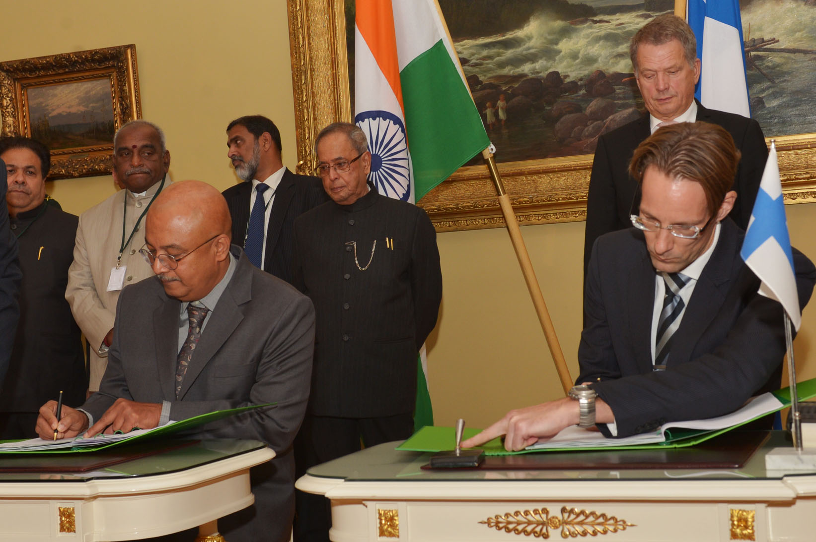 The President of India, Shri Pranab Mukherjee and the President of Finland, H.E. Mr. Sauli Niinisto witnessing signing of MOU on various subjects at Government House in Helsinki, Finland on October 15, 2014. 