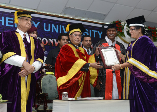 The President of India, Shri Pranab Mukherjee being felicitated by the Vice Chancellor of the Pondicherry University, Prof. Chandra Krishnamurthy at the 23rd Convocation of Pondicherry University in Puducherry on September 25, 2013. The Lt. Governor of Pu