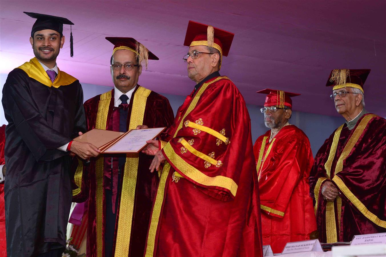 The President of India, Shri Pranab Mukherjee presenting a degree to a student at the first convocation of the Management Development Institute (MDI), Murshidabad in West Bengal on August 24, 2016. 