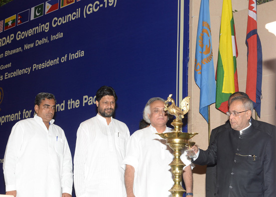 The President of India, Shri Pranab Mukherjee lighting the lamp at the inauguration of the Nineteenth Meeting of the Governing Council of the Centre on Integrated Rural Development for Asia and the Pacific (CIRDAP) at Vigyan Bhavan, New Delhi on September