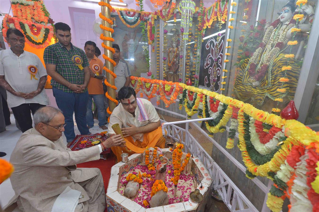 The President of India, Shri Pranab Mukherjee performing pooja at Shiv Mandir on the occasion of Janmashtami at President's Estate in New Delhi on August 25, 2016. 