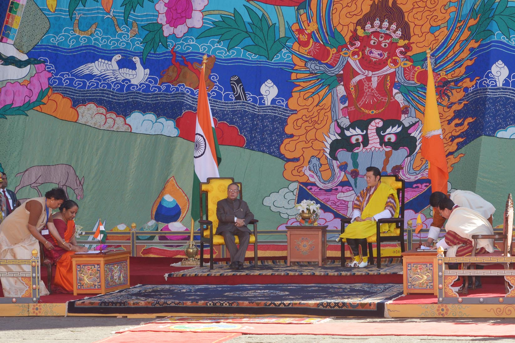 The President of India, Shri Pranab Mukherjee and King of Bhutan, His Majesty King Jigme Khesar Namgyel Wangchuck witnessing the Signing of a Memorandum of Understanding between the Bhutan and India on the Establishment of Nalanda University at Tashichho 