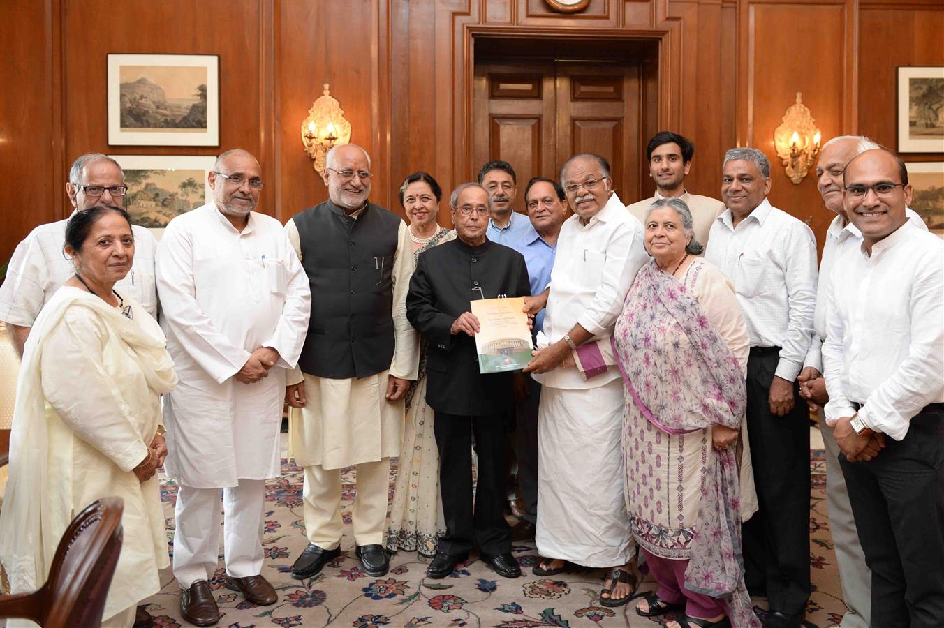 The Deputy Chairman of Rajya Sabha & Chairperson of Indian Association of Parliamentarian on Population & Development (IAPPD), Prof. PJ Kurien presenting the IAPPD's report titled "Content Analysis of Parliament Questions on Population and Health" to the 