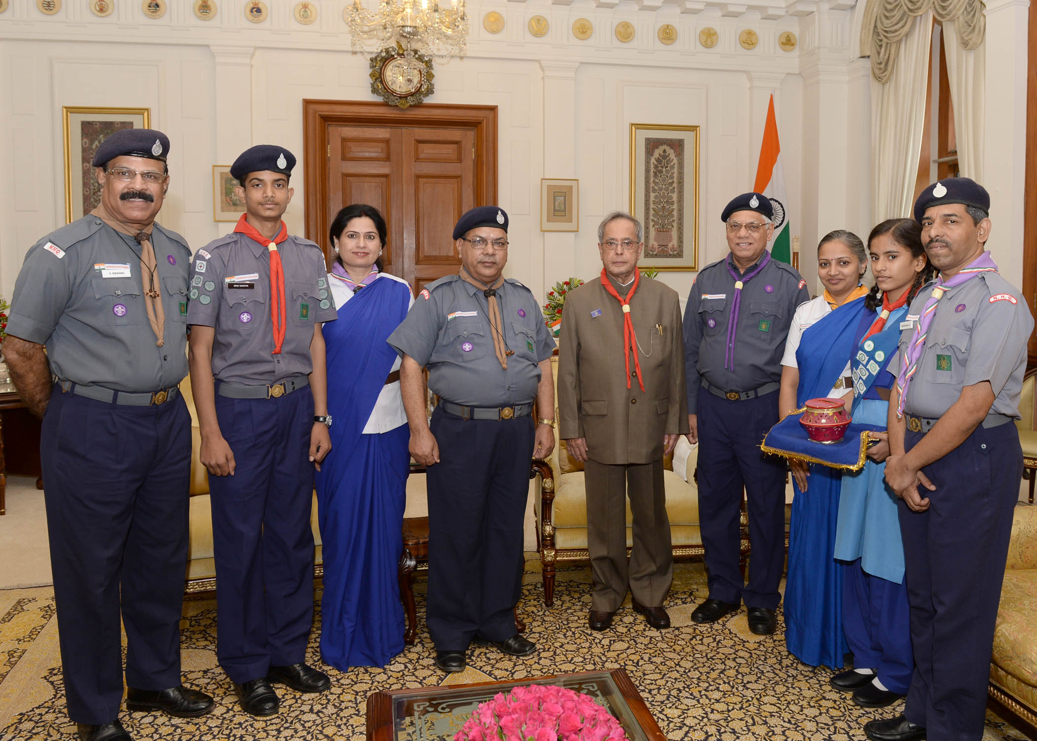 A delegation from the Bharat Scouts and Guides (National Headquarters) presenting the Bharat Scouts and Guides Flag Sticker at Rashtrapati Bhavan on November 10, 2014. 