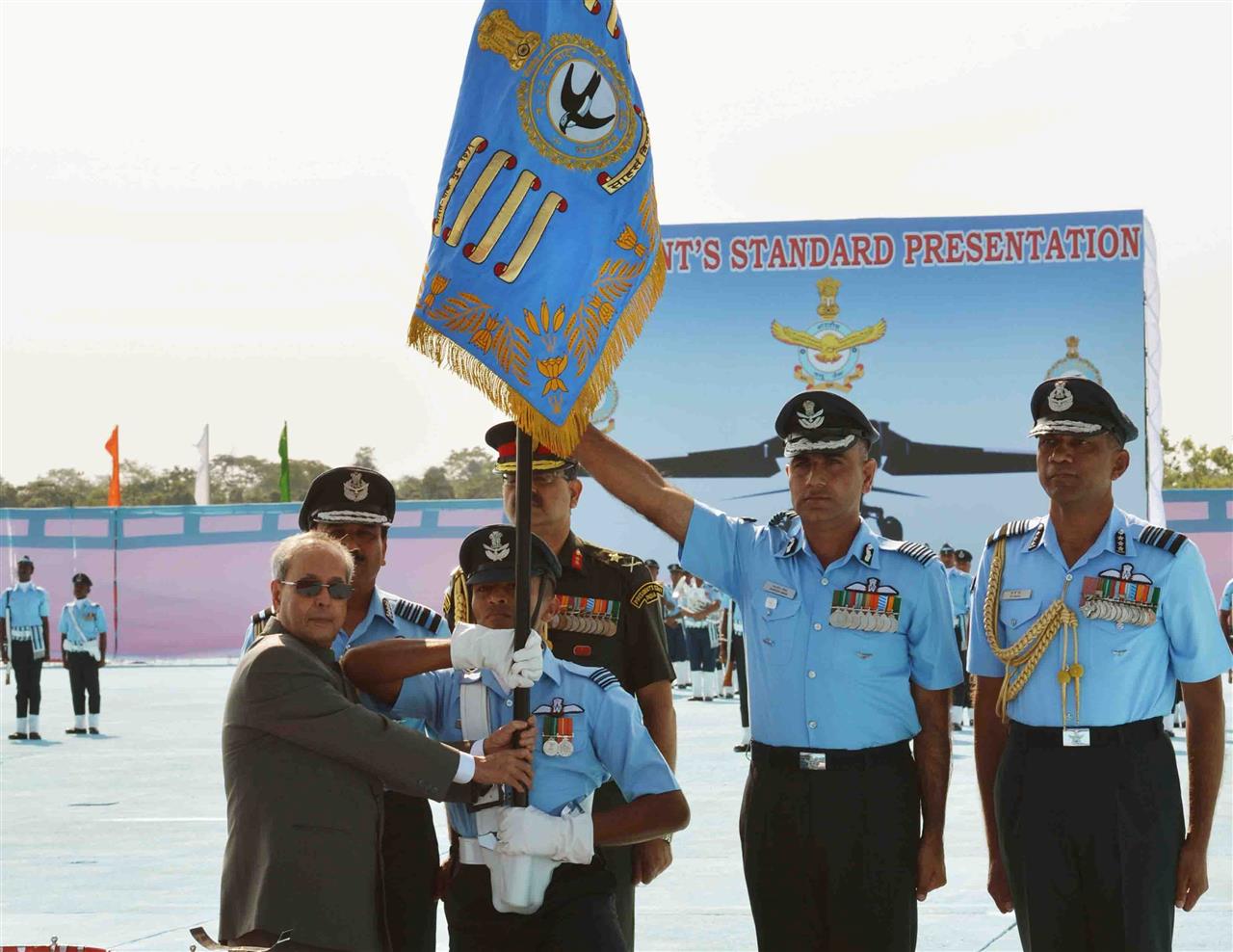 The President of India, Shri Pranab Mukherjee, presenting the Standard to 22 Sqn of Indian Air Force at Air Force Station, Hasimara, West Bengal on November 28, 2015.