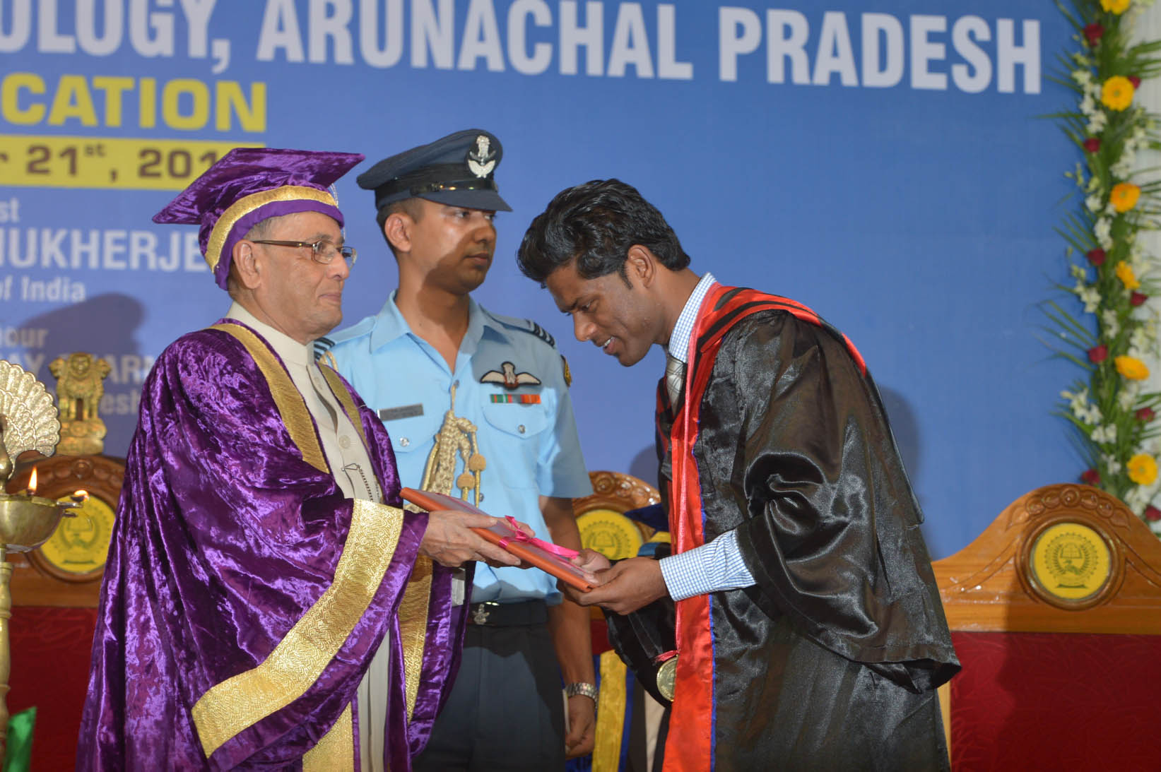 The President of India, Shri Pranab Mukherjee while presenting the degree to a student at the First Convocation of National Institute of Technology, Arunachal Pradesh at Yupia in Arunachal Pradesh on November 21, 2014. 