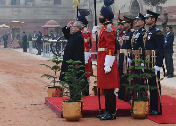 The President of India Shri Pranab Mukherjee talking the Salute from the President's Body Guard (PBG) at the Forecourt of Rashtrapati Bhavan before departure for attending the Beating Retreat function at Vijay Chowk in New Delhi on January 29, 2014. 