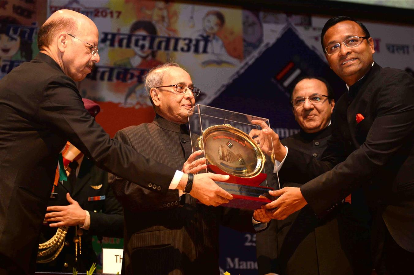 The President of India, Shri Pranab Mukherjee presenting the National Award at the National Voters' Day Celebration organized by the Election Commission of India in New Delhi on January 25, 2017.