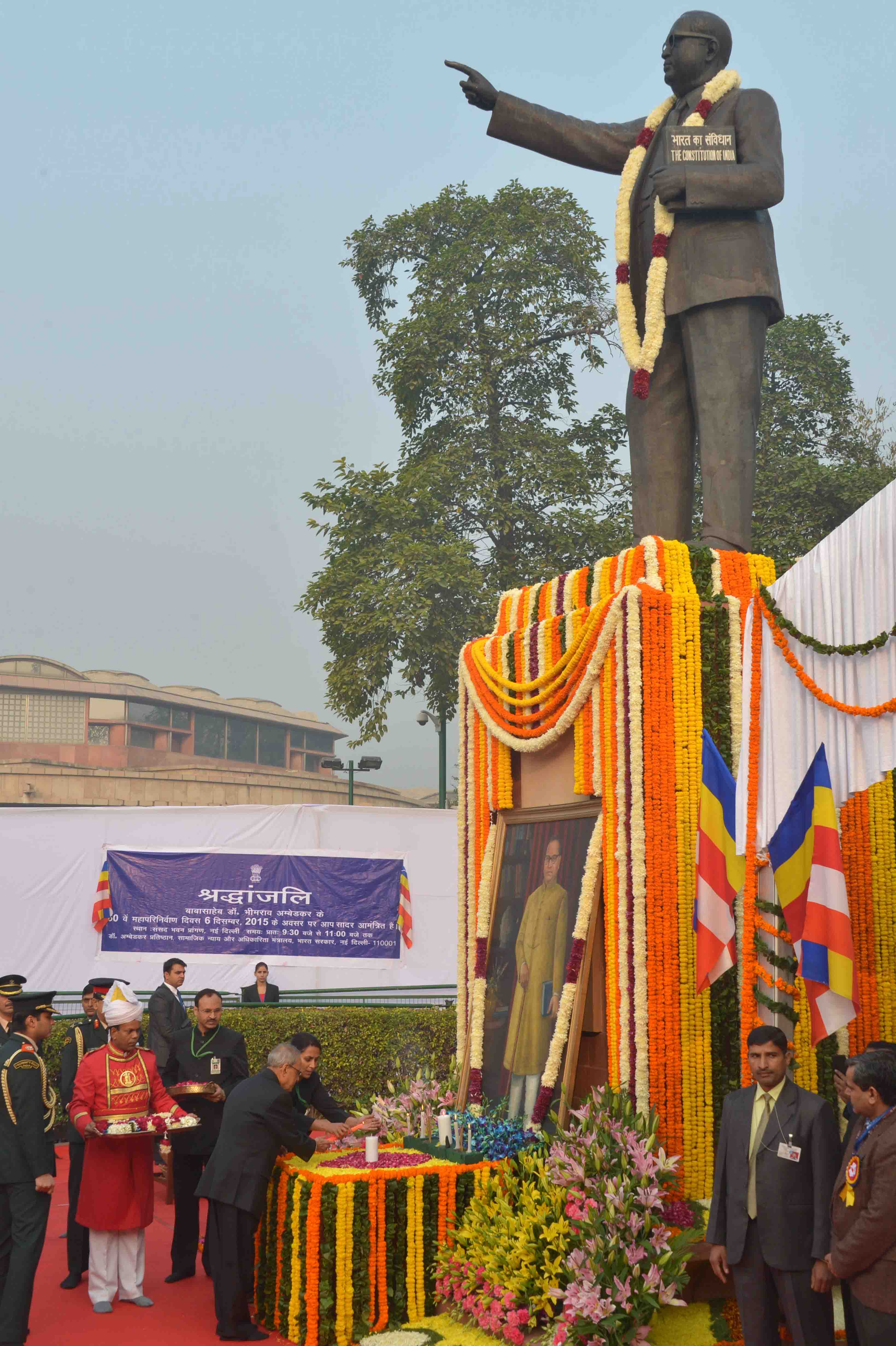 The President of India, Shri Pranab Mukherjee paying floral tributes at the statue of Babasaheb Dr. BR Ambedkar on the occasion of his Mahaparinirvan Divas at Parliament House Lawns, New Delhi on December 6, 2015.