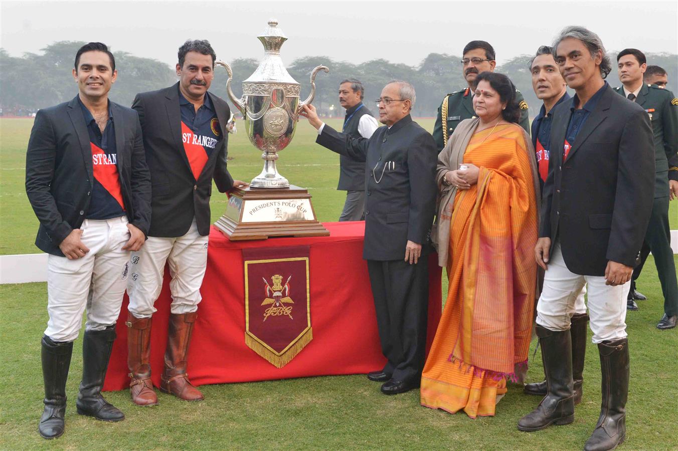 The President of India, Shri Pranab Mukherjee presenting the prizes to the participants of the President's Polo Cup Exhibition Match at PBG Parade Ground (Polo Field) on December 6, 2015.