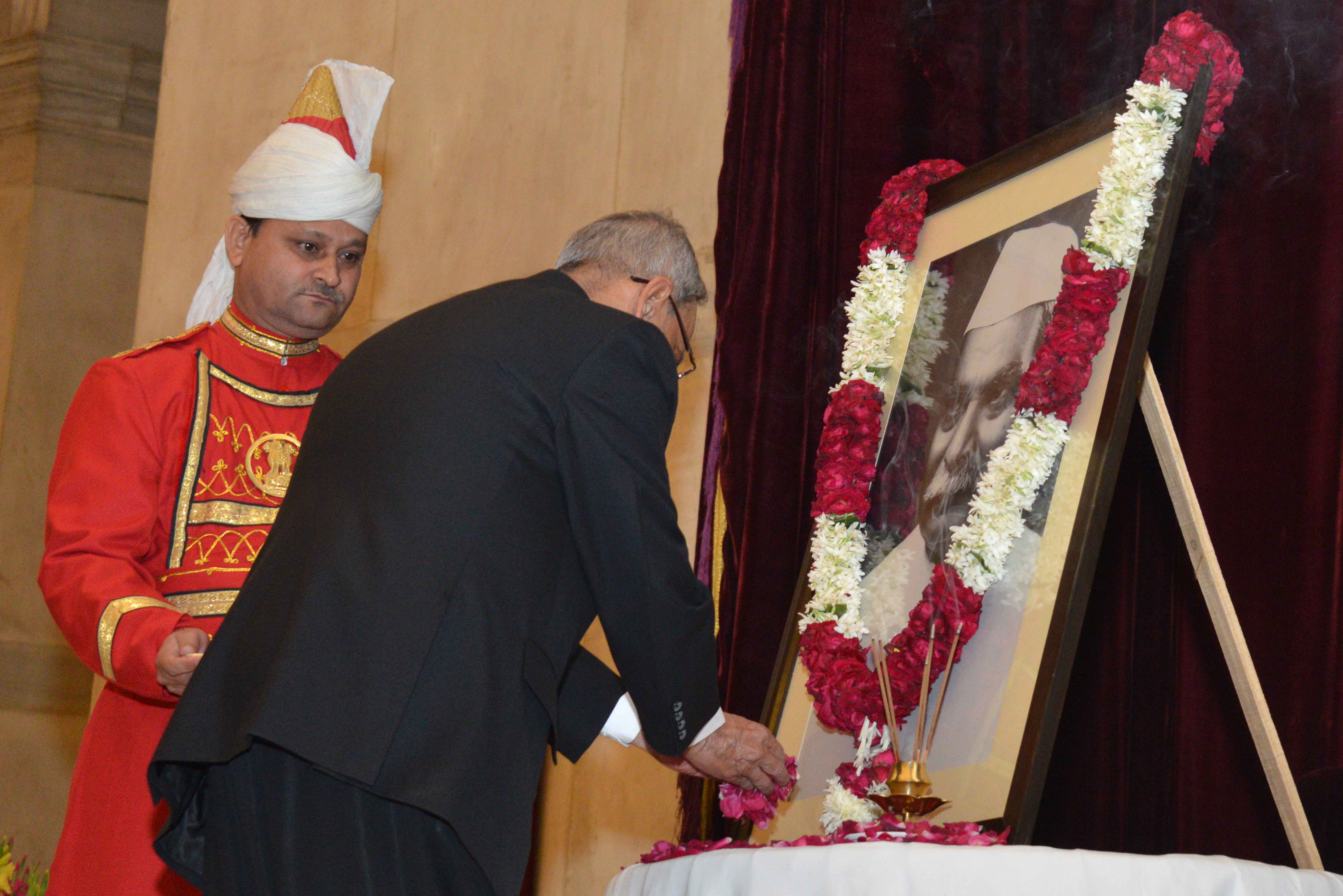 The President of India, Shri Pranab Mukherjee paying floral tributes at the portrait of the former President of India, Dr. Rajendra Prasad on the occasion of his Birth Anniversary at Rashtrapati Bhavan on December 3, 2014. 