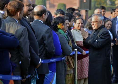 The President of India Shri Pranab Mukherjee meeting some of the invitees at the 'At Home' Reception hosted by the President on the lawns of the Mughal Gardens at Rashtrapati Bhavan in New Delhi on January 26, 2013 on the occasion of the 64th Republic Day