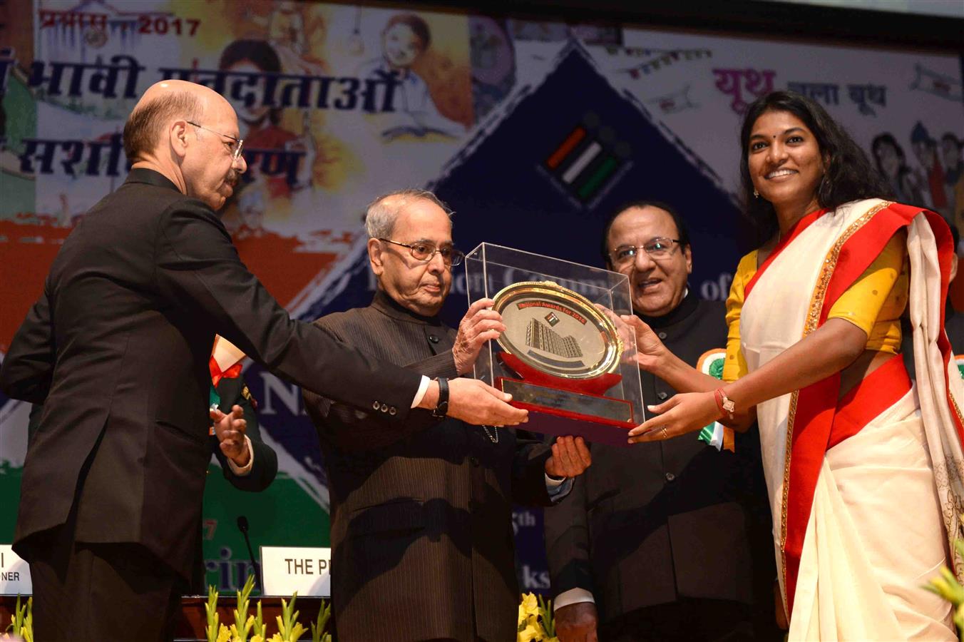 The President of India, Shri Pranab Mukherjee presenting the National Award at the National Voters' Day Celebration organized by the Election Commission of India in New Delhi on January 25, 2017.