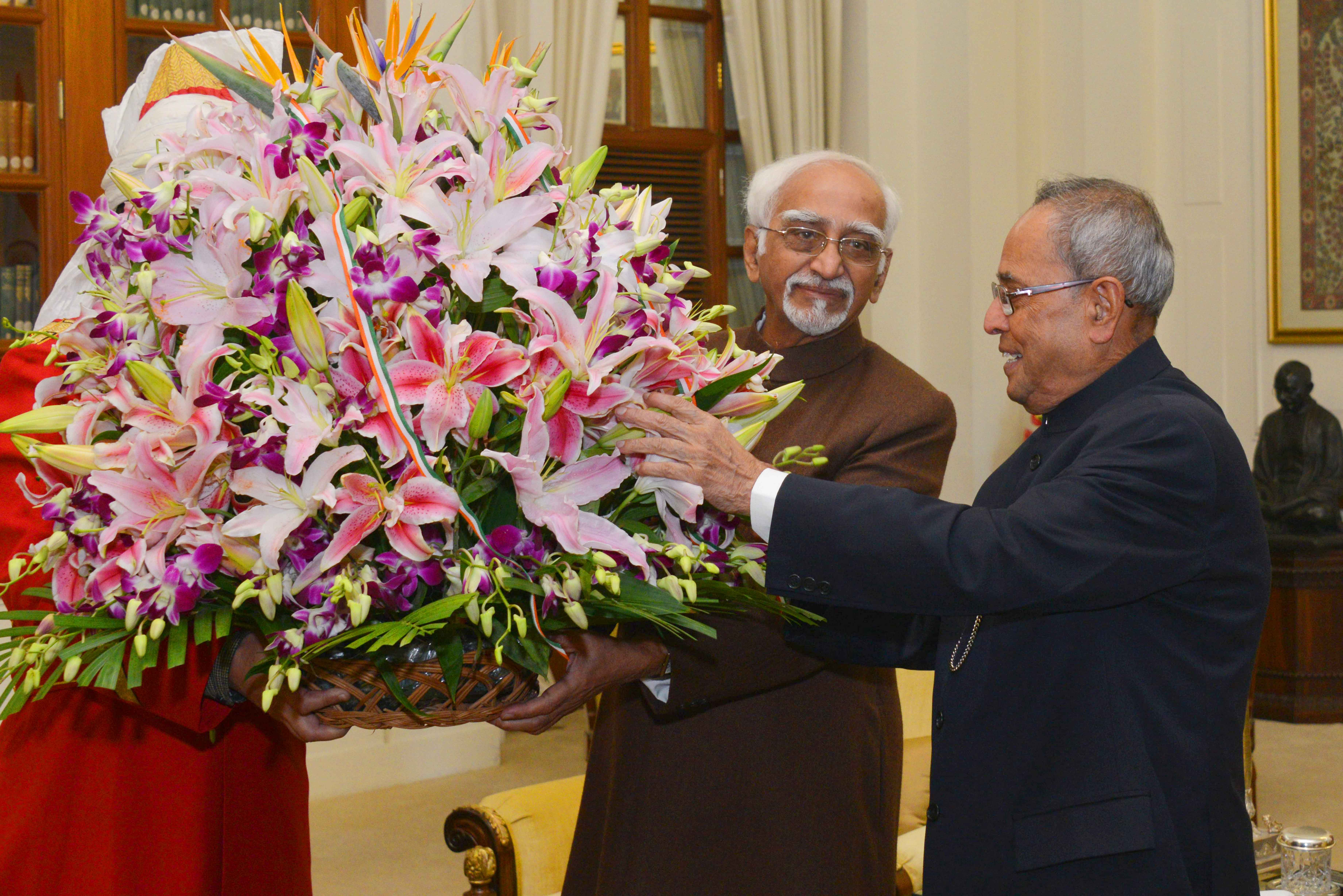 The President of India, Shri Pranab Mukherjee being greeted at Rashtrapati Bhavan on December 11, 2014 by the Vice-President of India, Shri Mohd. Hamid Ansari on the occasion of his birthday. 