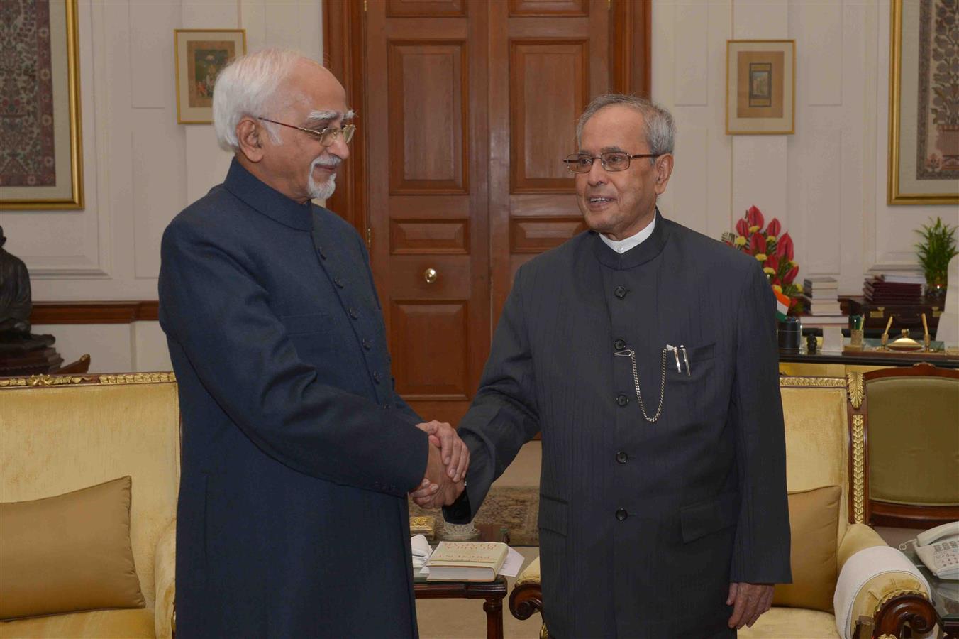 The President of India, Shri Pranab Mukherjee being greeted at Rashtrapati Bhavan on December 11, 2015 by the Vice-President of India, Shri Mohd. Hamid Ansari on the occasion of his 80th birthday.