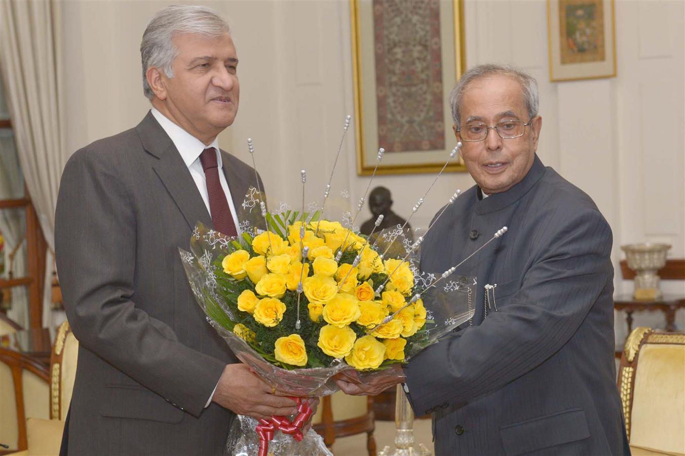 The President of India, Shri Pranab Mukherjee being greeted at Rashtrapati Bhavan on December 11, 2015 by the Governor of Uttarakhand, Dr. KK Paul on the occasion of his 80th birthday.