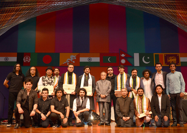 The President of India, Shri Pranab Mukherjee with the artists after witnessing a performance by the SAARC Bands at Rashtrapati Bhavan Auditorium In New Delhi on November 28, 2013.