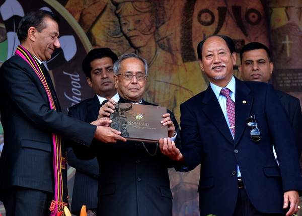 The President of India, Shri Pranab Mukherjee releasing a Coffee Table Book on the occasion of Nagaland State’s Golden Jubilee Year Celebrations and Hornbill Festival 2013 at Kisama at Nagaland on December 1, 2013.