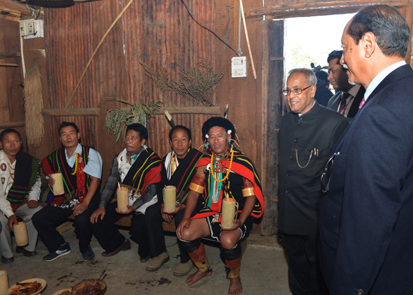 The President of India, Shri Pranab Mukherjee visiting the Pochury and Chakhesang Morung (Tribal Huts with Tribal People) at Window of Nagaland Gate, Kisama at Nagaland on December 1, 2013.